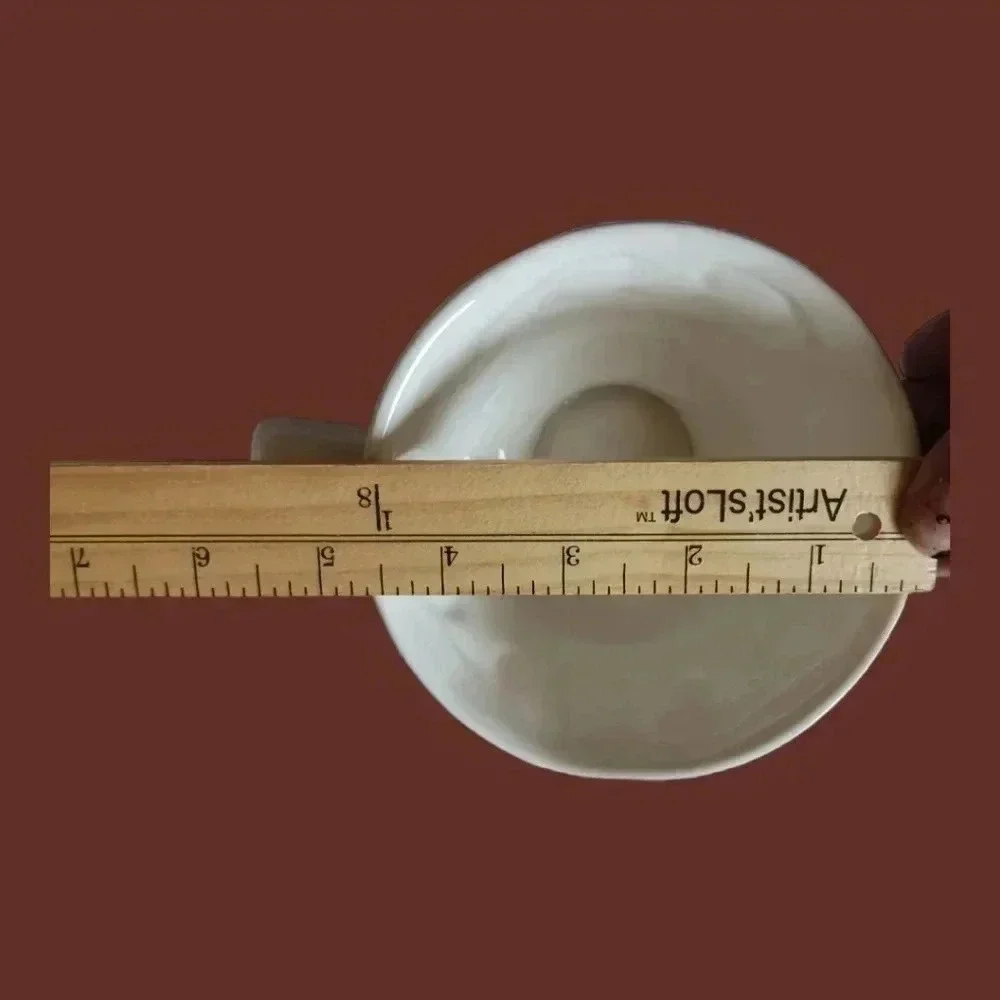Shabby chic porcelain teacup and saucer